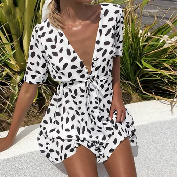 Playa blanca spot mini vestido de verano de las señoras de V-cuello de playa casual falda sexy de la moda de envoltura apretada falda de las mujeres 2020 grande de venta de nuevo